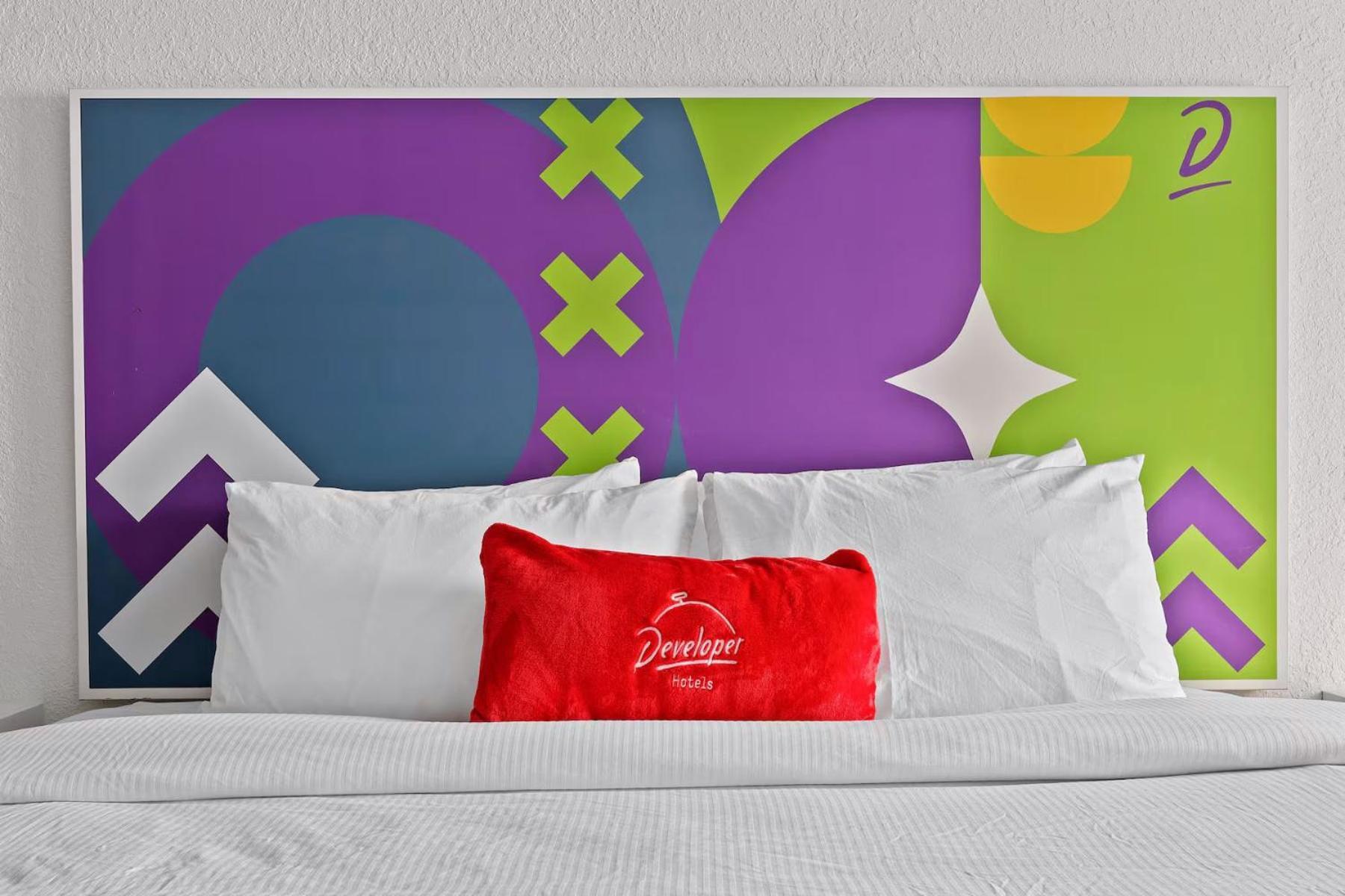 Room One King Bed Mobility or Hearing Access Tub Grab Bars Courtyard View Non-Smoking