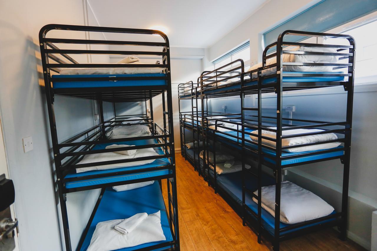 Bed in 12 Bed Mixed Dormitory Room with Shared Bathroom